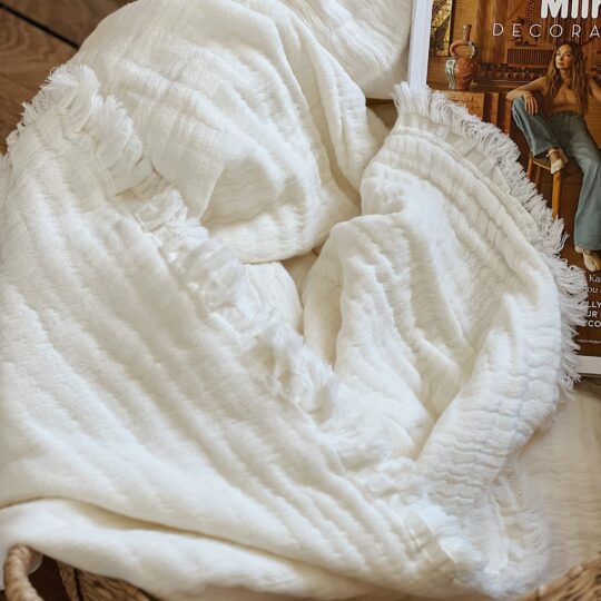 Plaid en coton ivoire avec franges
