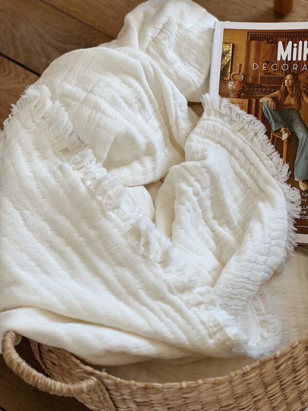 Plaid en coton ivoire avec franges