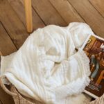 Plaid en coton ivoire avec franges