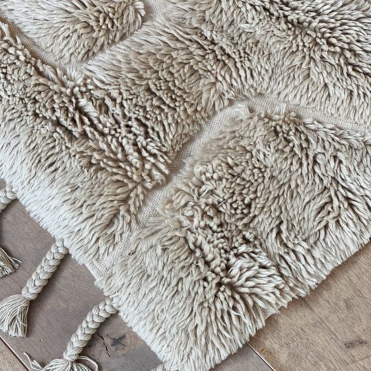 Tapis laine beige texture douce