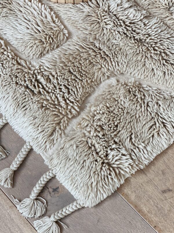 Tapis laine beige texture douce