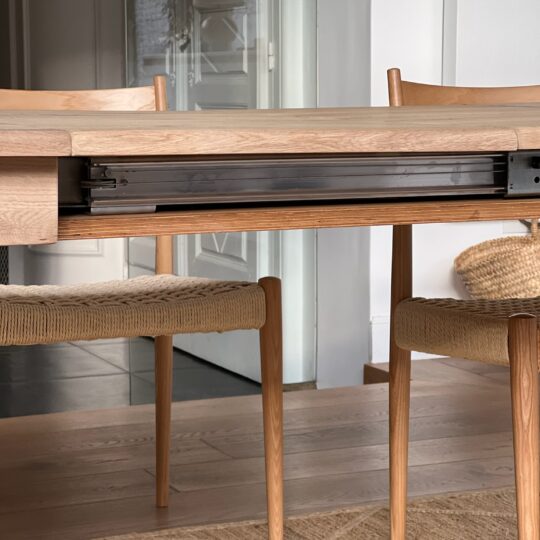 Table avec rallonges intégrées