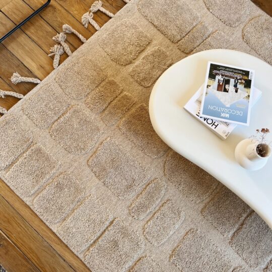 Tapis laine beige à motifs