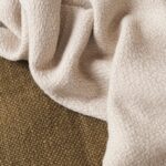 détail plaid en coton beige