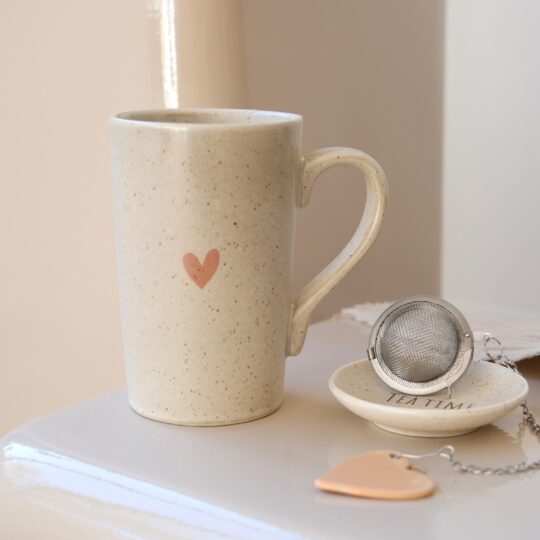 tasse à thé porcelaine soucoupe et boule à thé